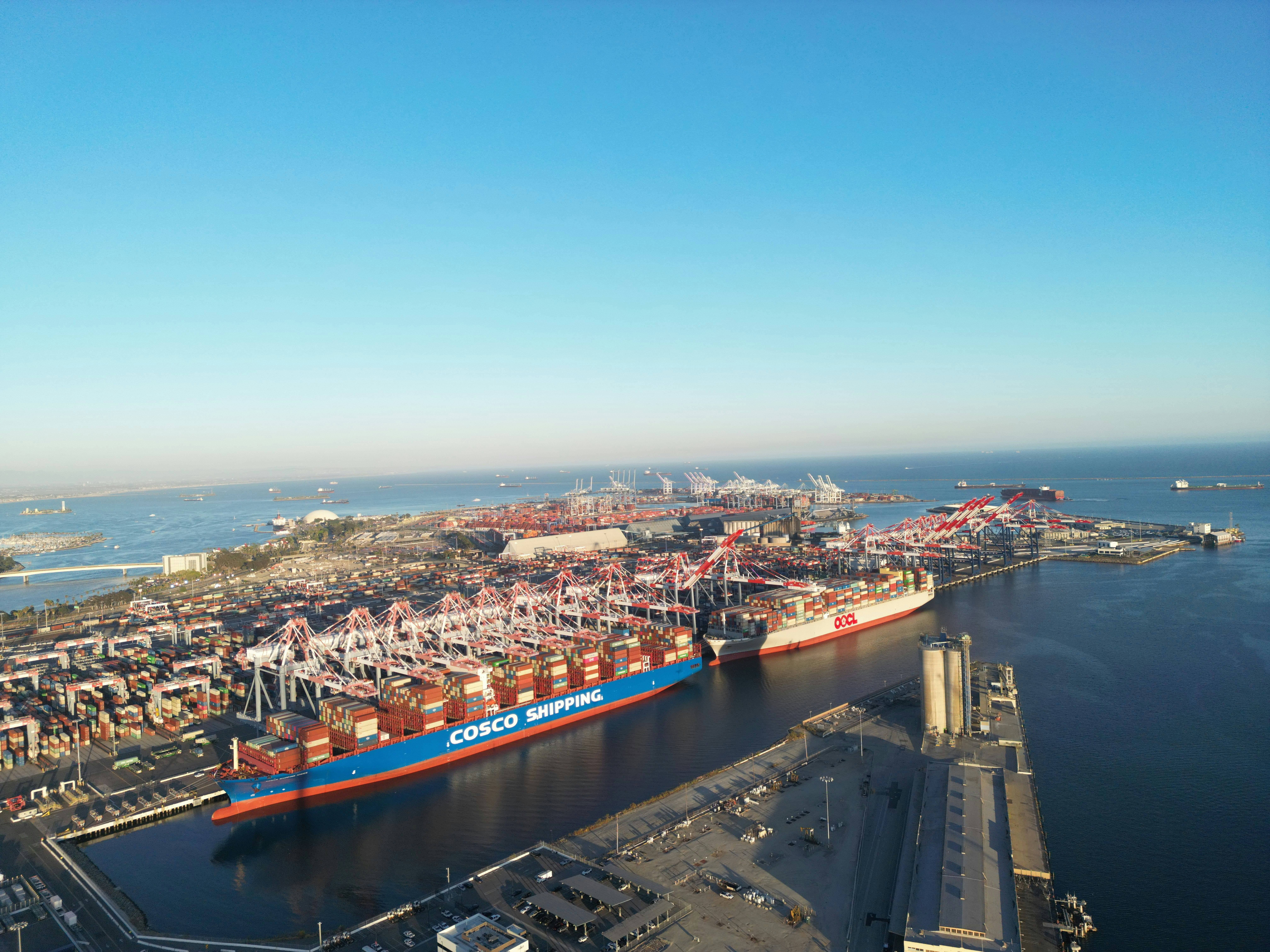 Cargo ship at a U.S. port representing the 10% Section 122 import surcharge